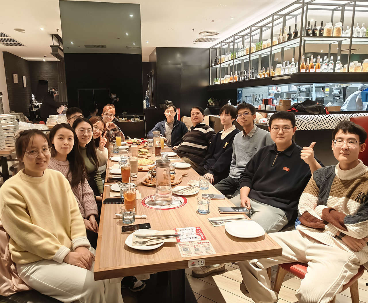 Lin Zhi Lab group photo at the lab's Christmas gathering, 2024
